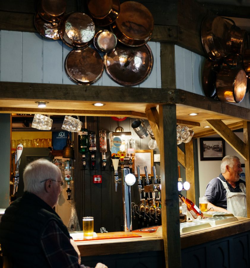 Photo of two men sitting at a pubs bar © Nicci Peet Photography