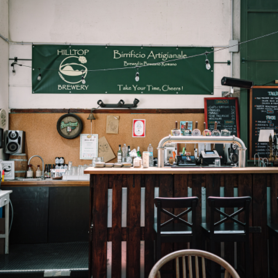 Photo of the Hilltop Brewery bar space with a row of keg taps © Hilltop Brewery