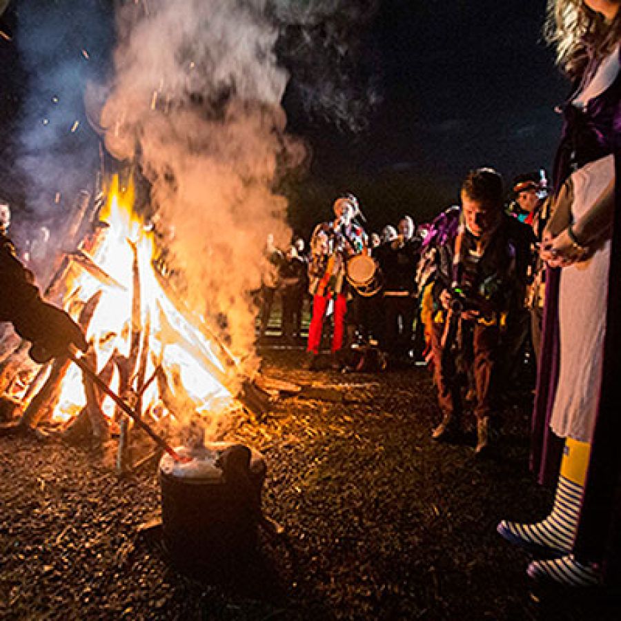 Music being played and people gathered around a bonfire at night ; ©2014, Bill Bradshaw Photography