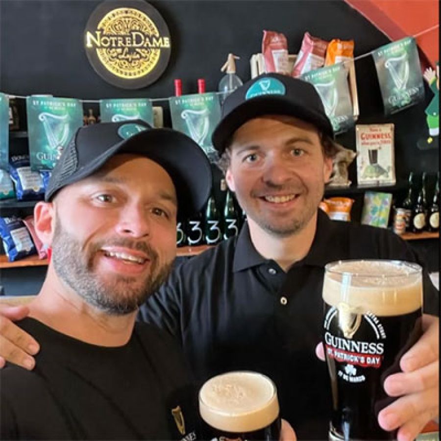 Two men drinking beer in the Notre Dame pub © David Jesudason