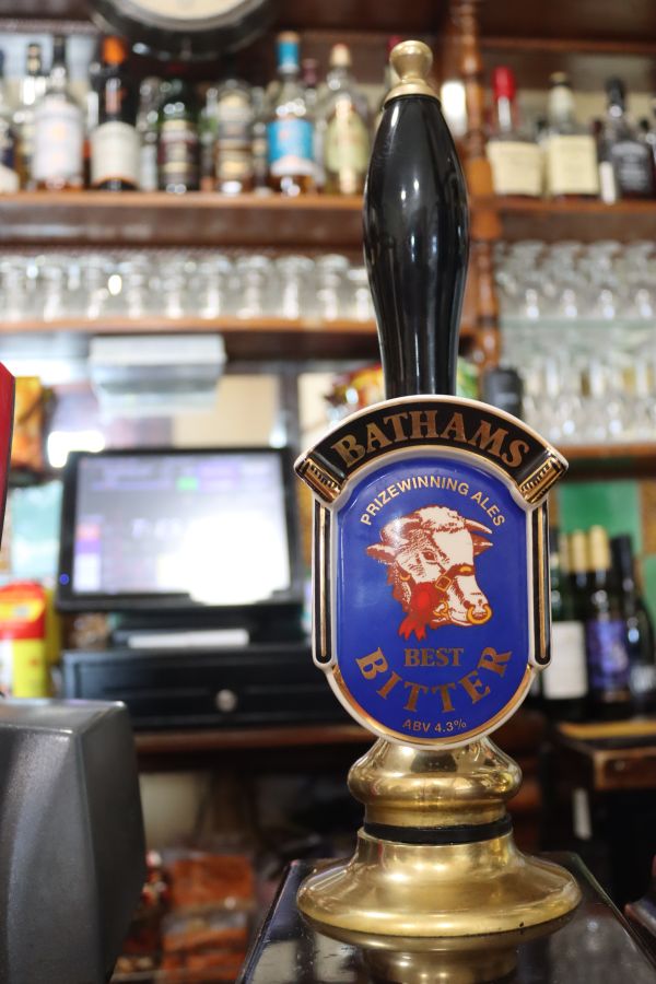 Photo of a hand pump and pump clip with Bathams Best Bitter on it