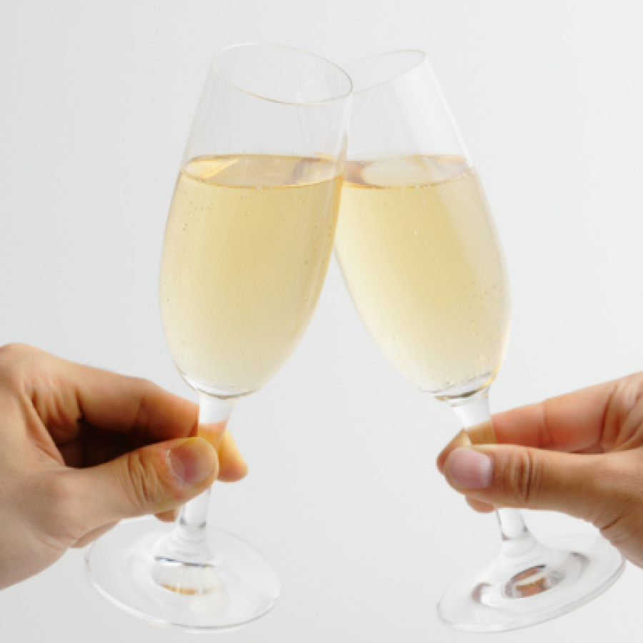 Cheers with two champagne flutes © Aflo Images
