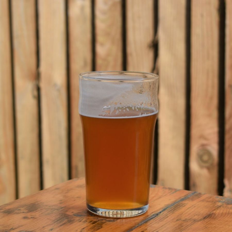 Photo of a pale ale beer partially drunk. Taken by Hollie Stephens